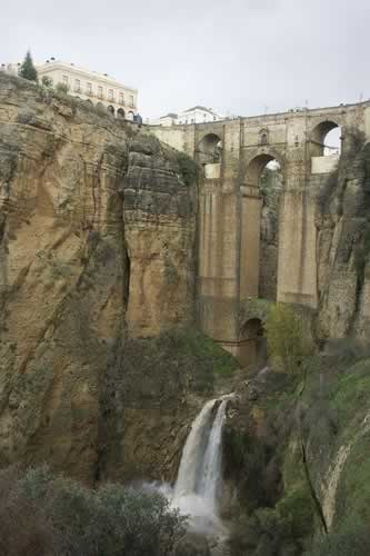 New Bridge Ronda with waterfall of The River 'Rio Guadalevin'. 