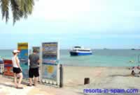 Boat posters on Figueretas Sea Front Promenade