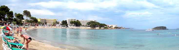 Panoramic view of the northern half of Es Canar beach