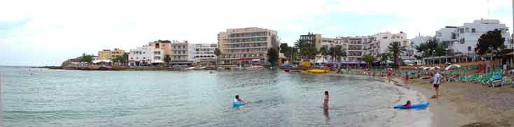 Panoramic view of the southern section of Es Canar beach