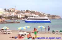 Figueretas jetty with a Glass Bottom boat arriving