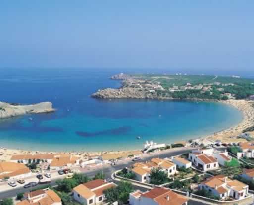 Arenal D'En Castell, beach & horseshoe bay with protective headlands 